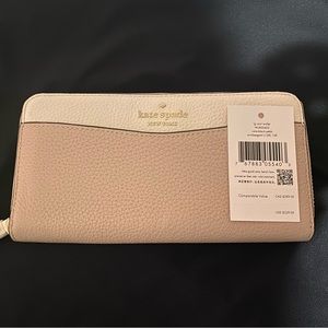 Kate Spade long wallet, new with tag.